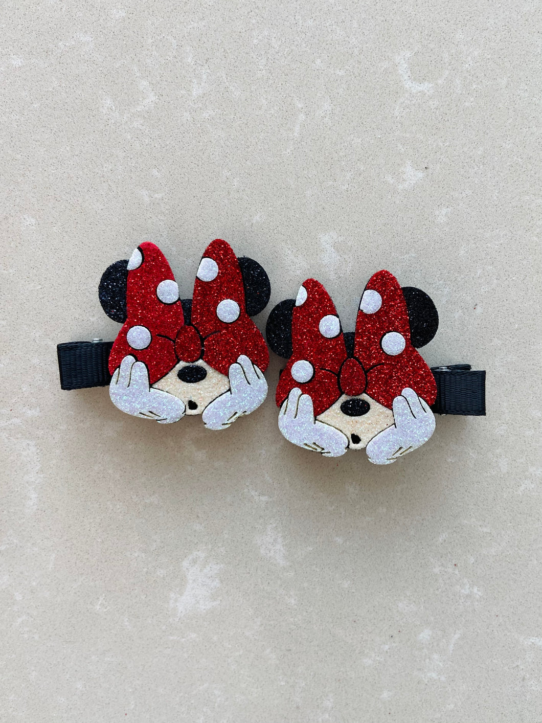 Pair of Minnie Mouse Oops hair clips