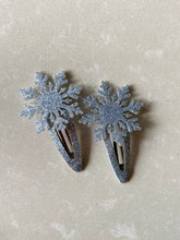 Load image into Gallery viewer, Pair of Shimmering Snowflake click clack hair clips
