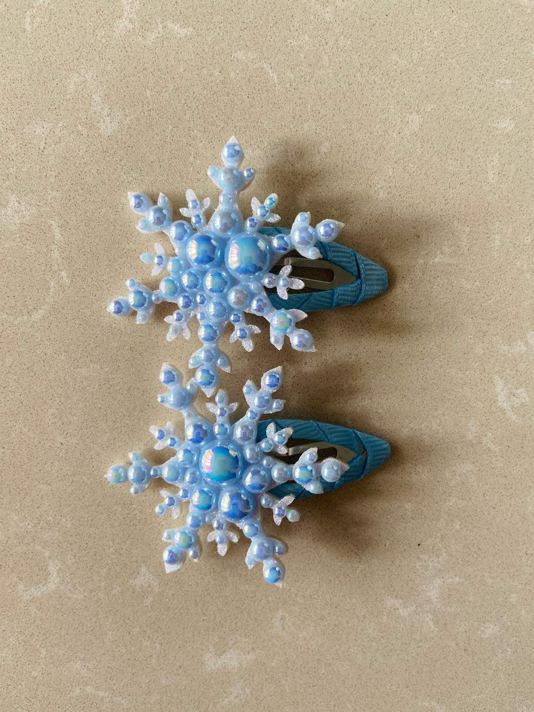 Pair of Pearl Snowflake click clack hair clips